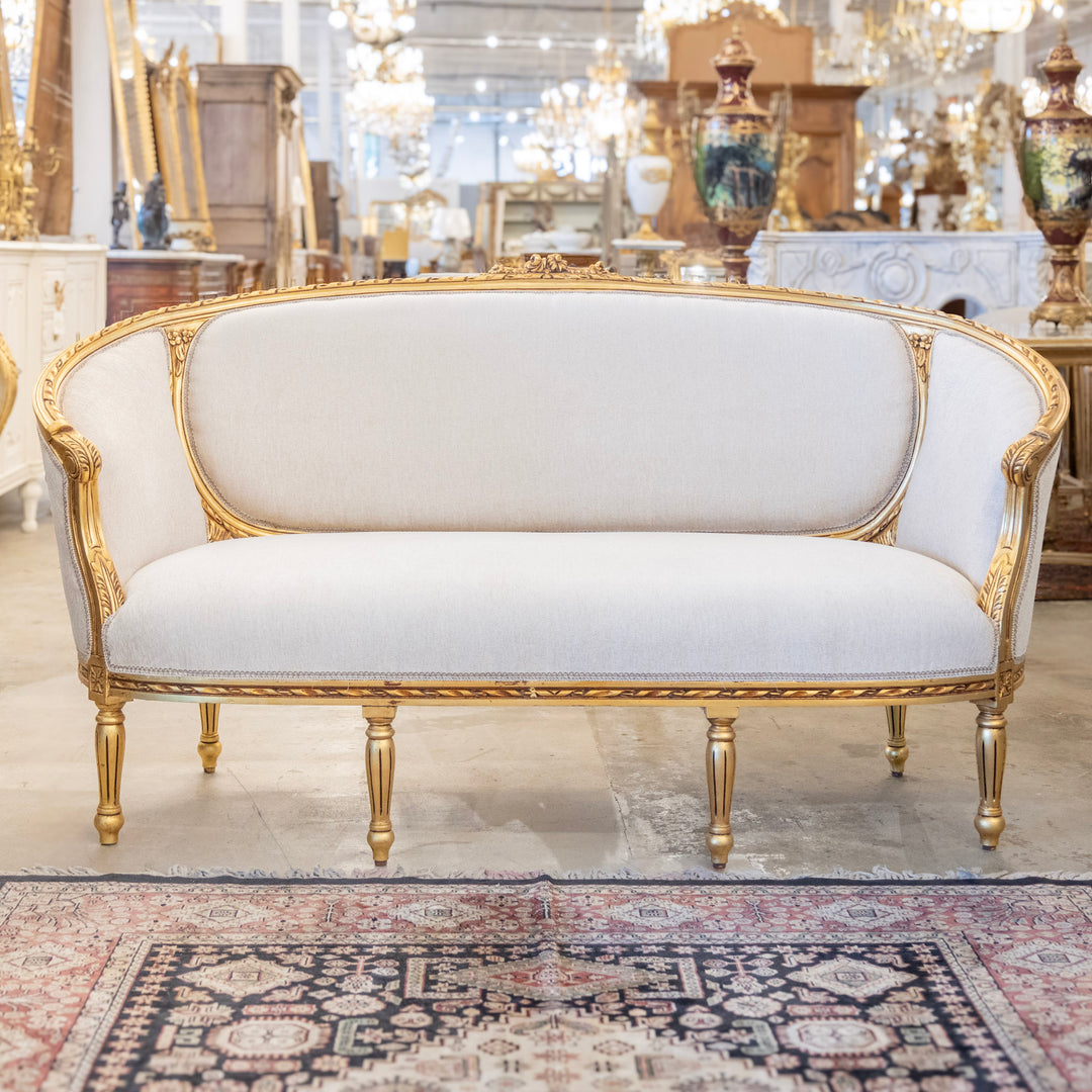 French Louis XVI Gilded Sofa – Textured White Upholstery & Floral Crest