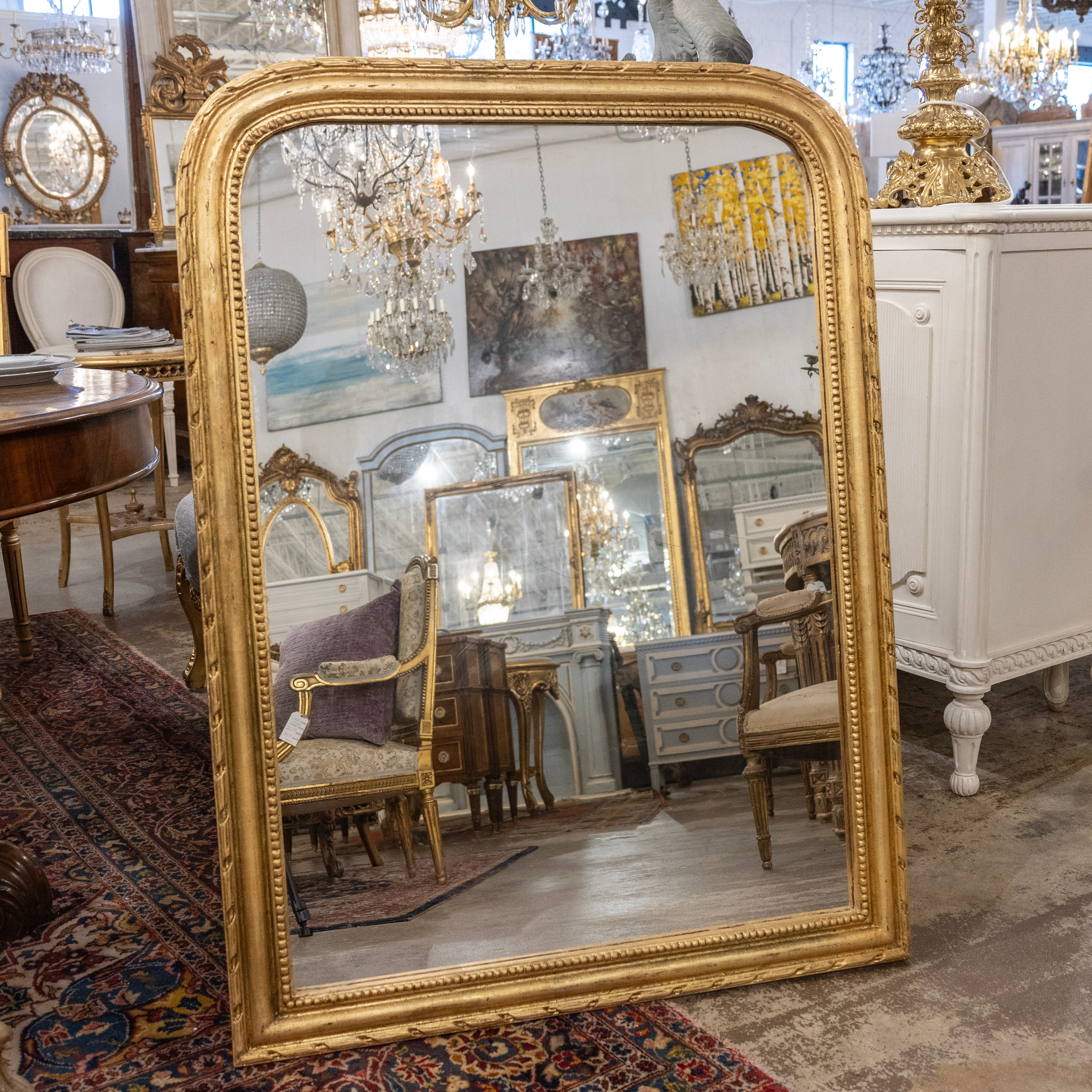 Louis Philippe Wide Gilded Mirror – Beaded & Rope Carved Trim – Le Chateau