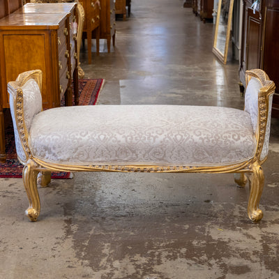 Louis XV Gilded Curule Bench – Floral Carvings & Beige Damask Upholstery