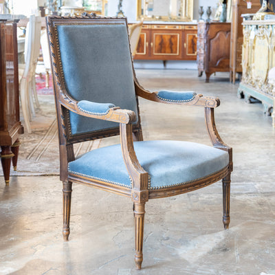 Louis XVI Carved Armchair – Wood Frame with Blue Velvet Upholstery
