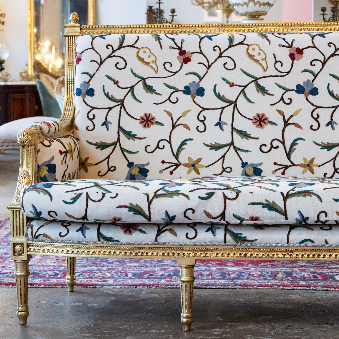 Louis XVI Gilded Settee – White Linen & Embroidered Floral Upholstery