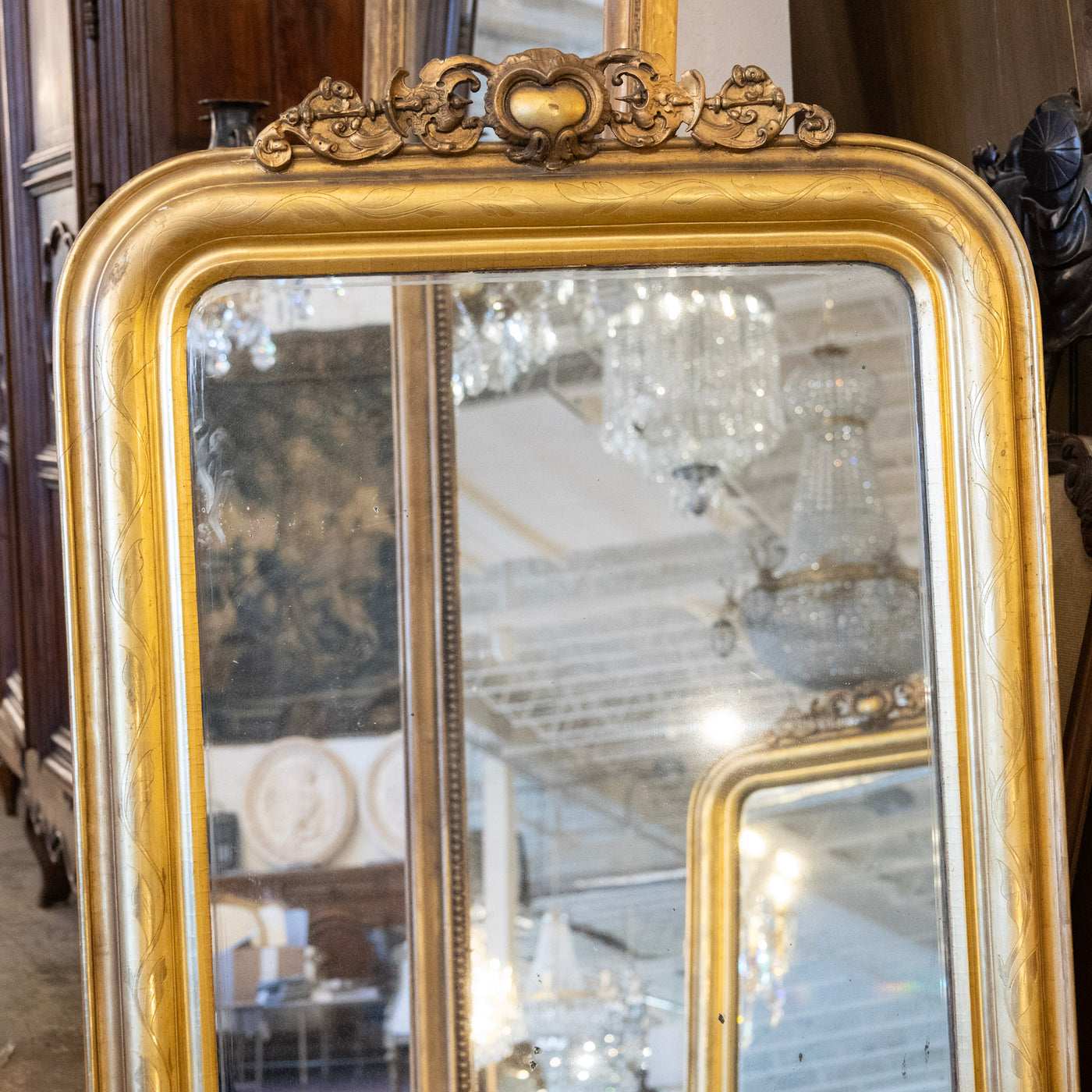 Louis Philippe Gilded Mirror with Floral Trim & Carved Crest