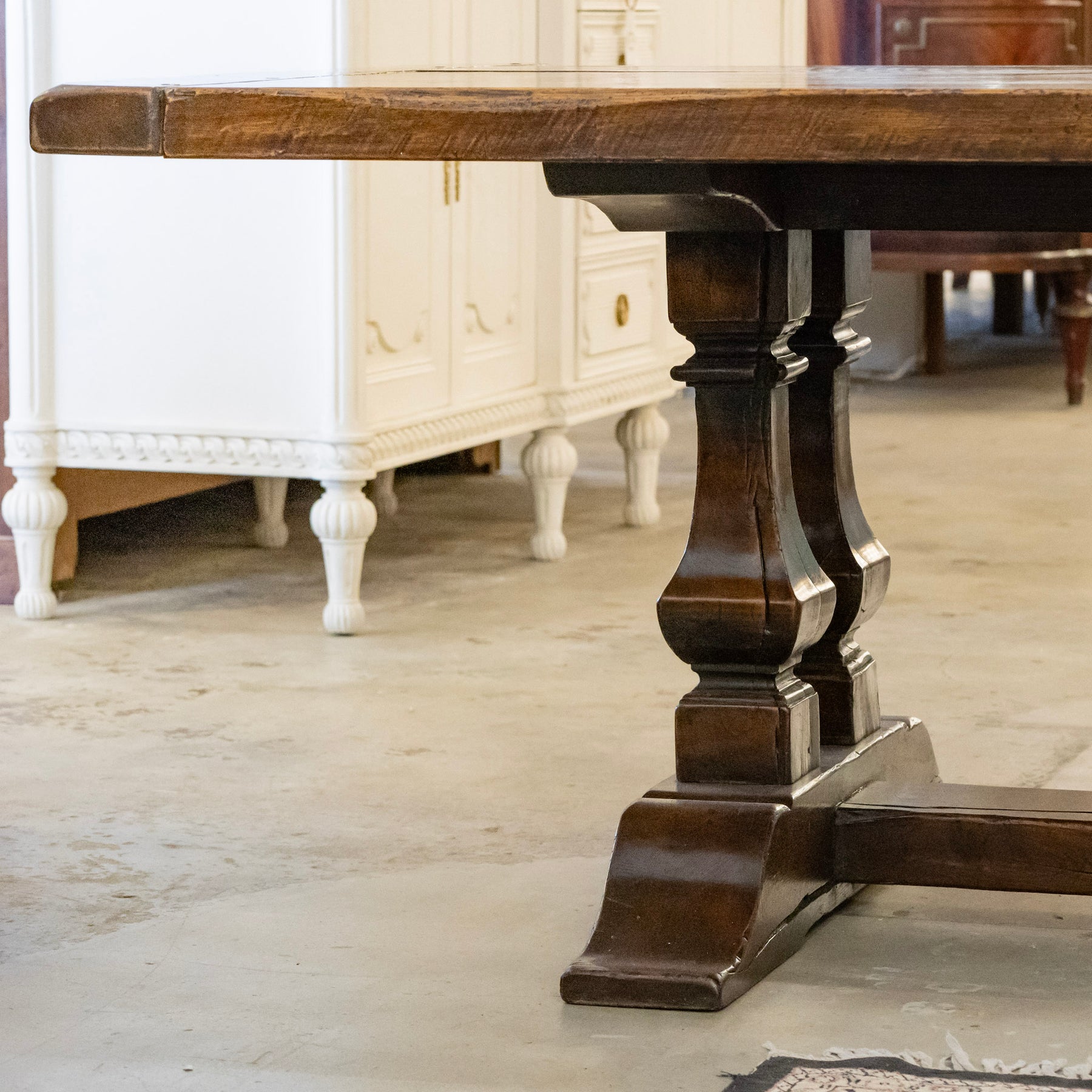 Farmhouse Dining Table – Rustic Dark Wood With Trestle Base – Le Chateau