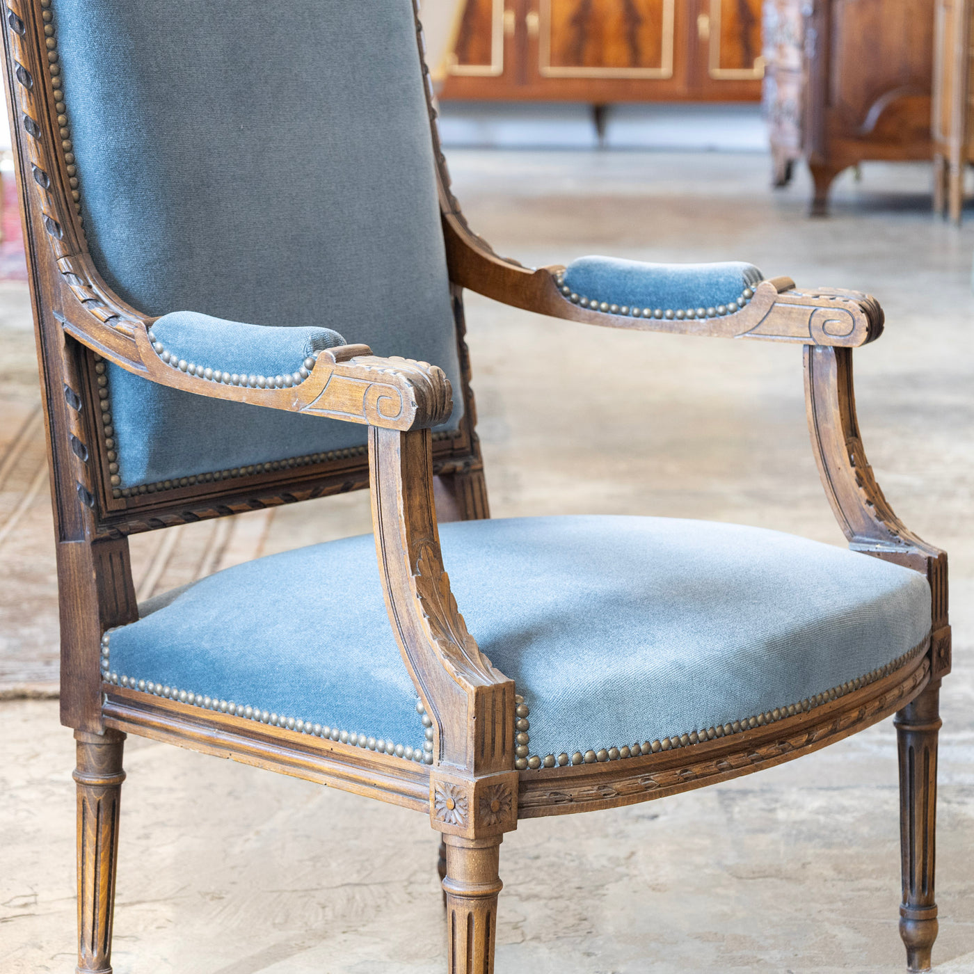 Louis XVI Carved Armchair – Wood Frame with Blue Velvet Upholstery