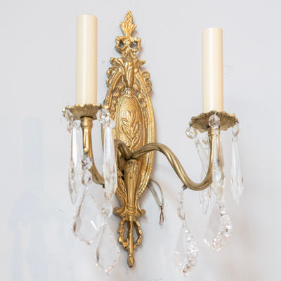 Pair of Louis XVI Gilded Brass Sconces – Carved Oval Backplate & Crystal Drops