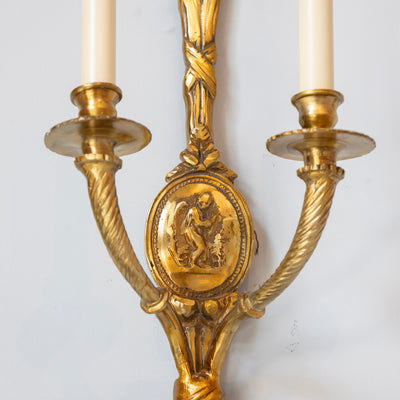 Pair of Louis XVI Gilded Wall Sconces – Ribbon Frame & Neoclassical Portrait