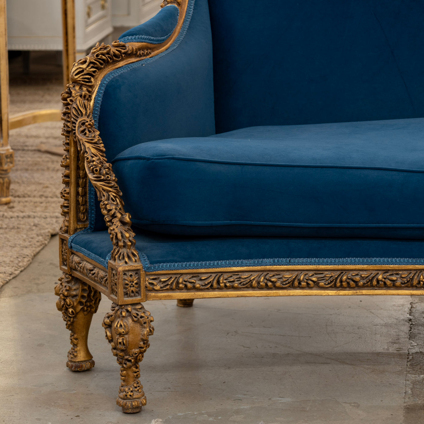 Louis XVI Gilded Sofa – Carved Detailing & Dark Blue Velvet Upholstery