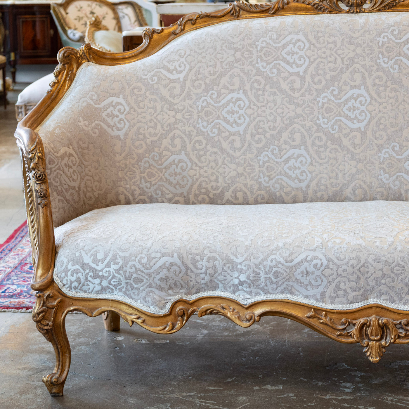 Louis XV Gilded Sofa – Carved Frame & Cream Damask Upholstery