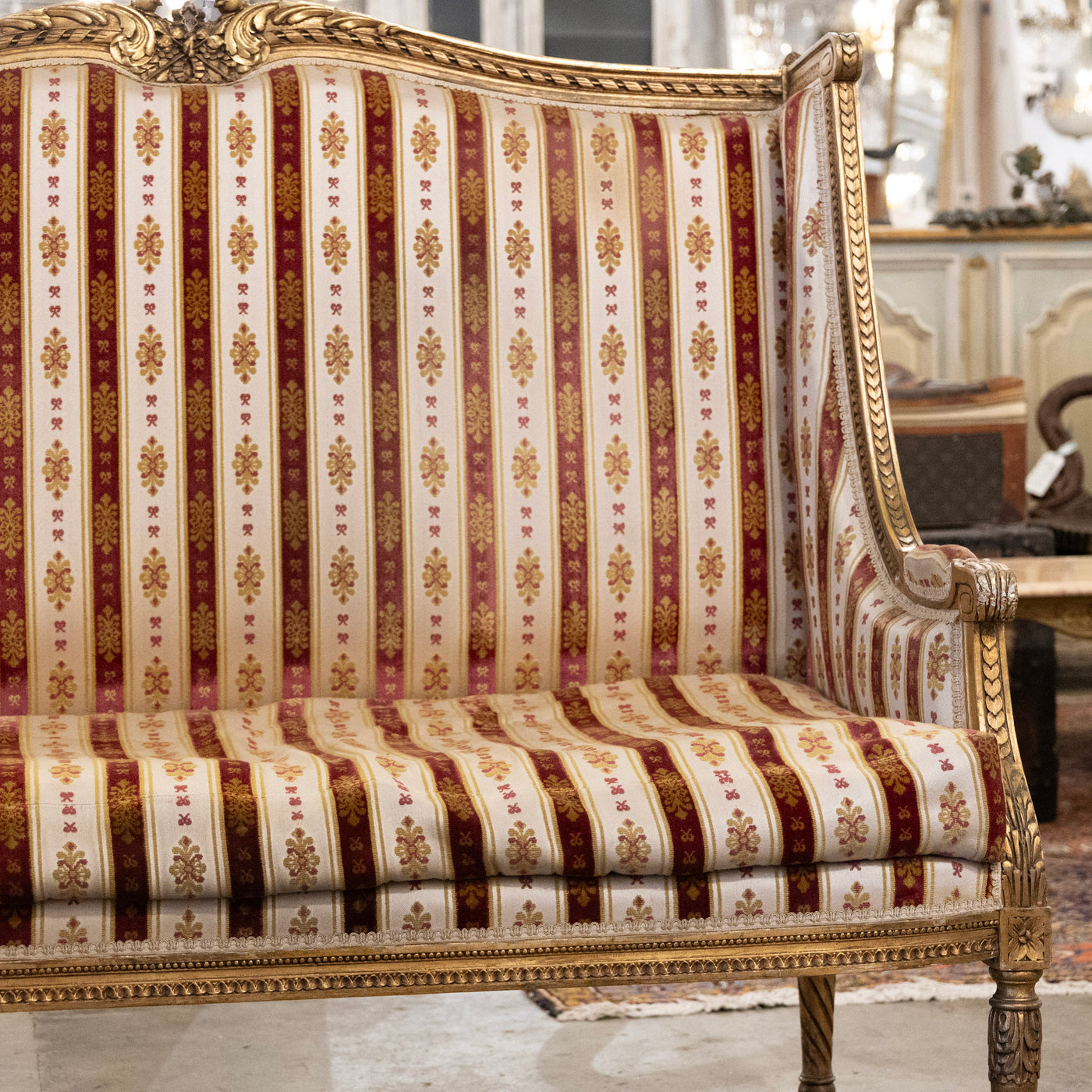 Louis XVI Carved Gilded Settee – Striped Damask Upholstery
