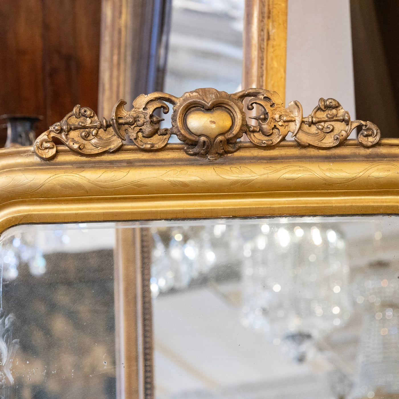 Louis Philippe Gilded Mirror with Floral Trim & Carved Crest