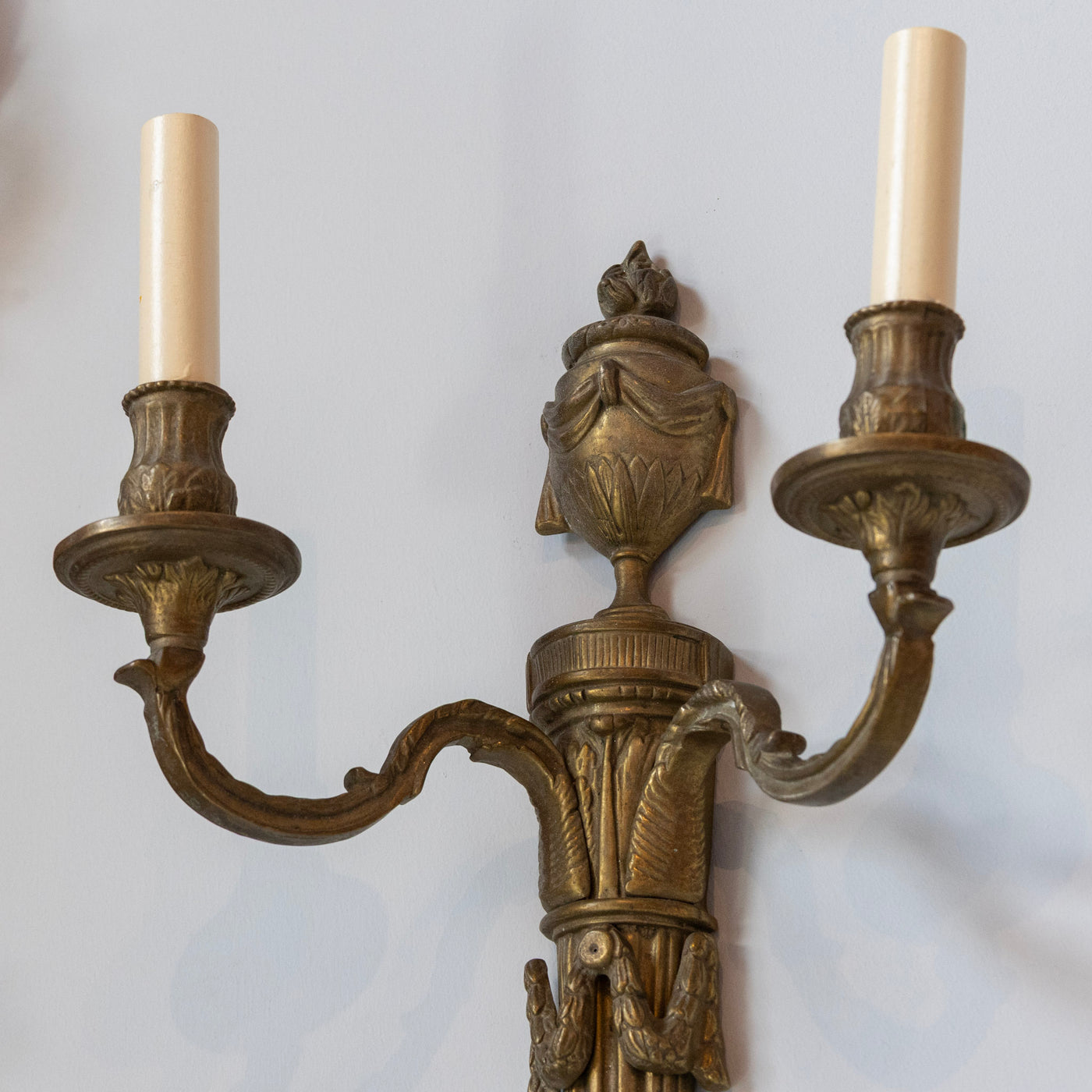Pair of Louis XVI Dark Brass Wall Sconces – Urn Finial & Laurel Carvings