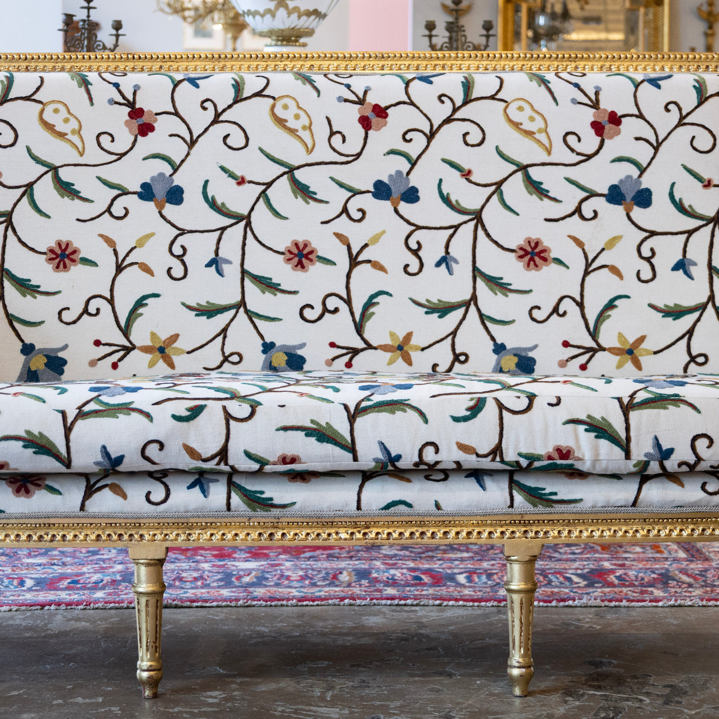 Louis XVI Gilded Settee – White Linen & Embroidered Floral Upholstery