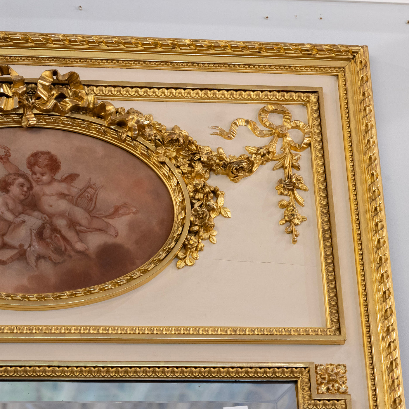Louis XVI Gilded Trumeau Mirror – Cherub Painting & Bow Carvings