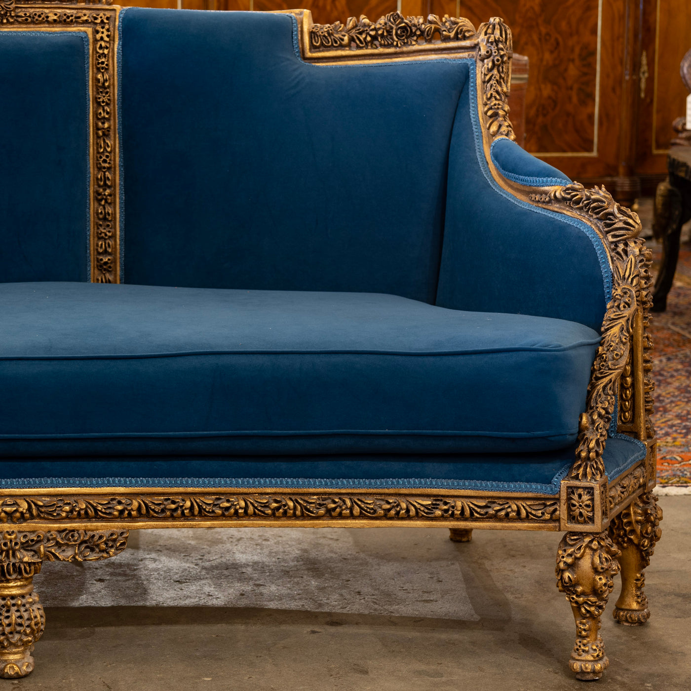 Louis XVI Gilded Sofa – Carved Detailing & Dark Blue Velvet Upholstery