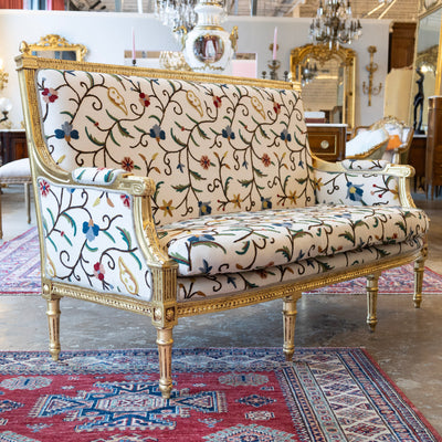 Louis XVI Gilded Settee – White Linen & Embroidered Floral Upholstery