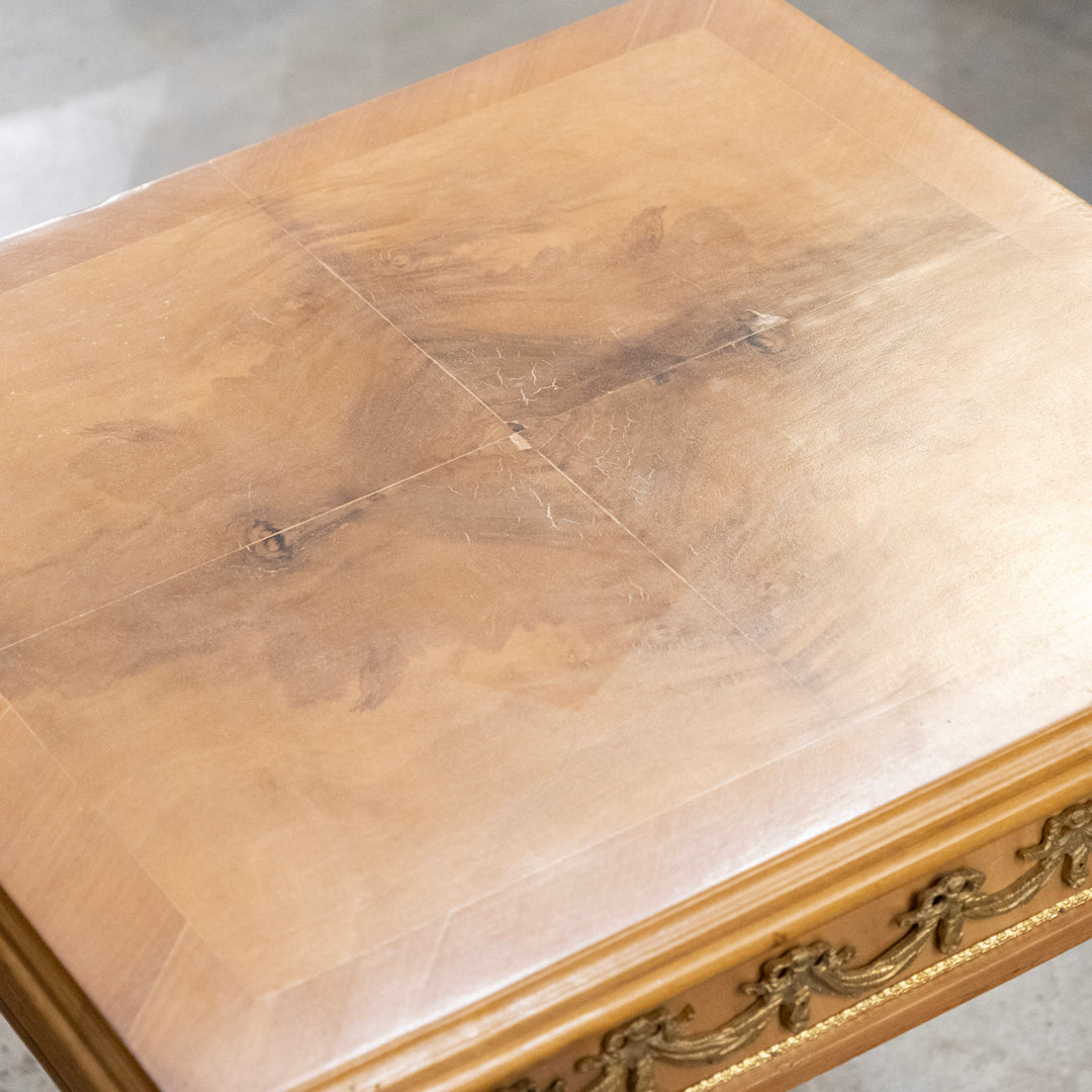 Louis XVI Side Table – Burl Wood with Brass Bow Trim – Le Chateau