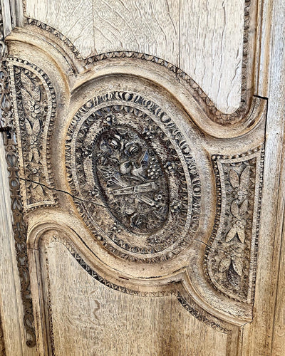 17th Century French Armoire with Carved Floral Bouquet