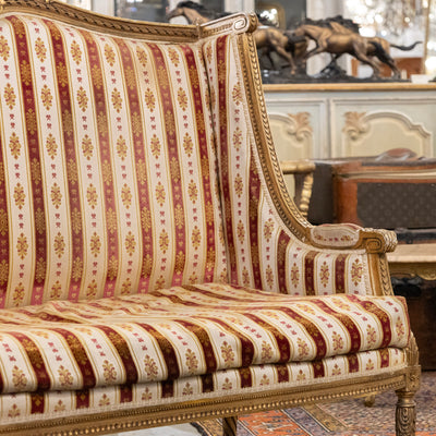 Louis XVI Carved Gilded Settee – Striped Damask Upholstery