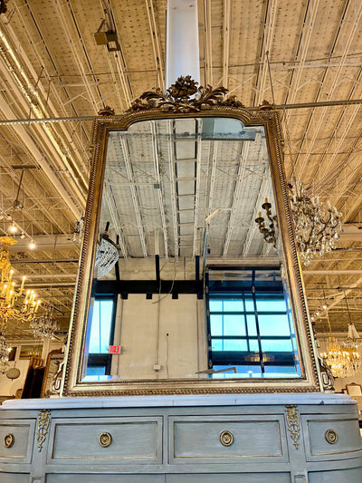 Ornate Mirror with a Gilded Crest and Beaded Details